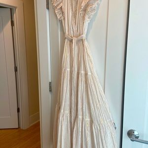 ASTR sundress with rose gold, gold and silver metallic stripes throughout.